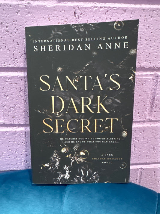 Santa’s dark secret- Sheridan Anne (signed)